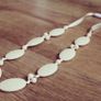 Navajo white teething necklace for babies and parents. Image 2