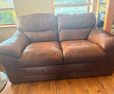 Genuine Harvey Norman brown leather couch