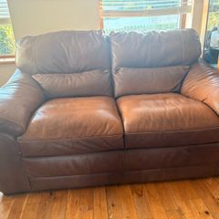 Genuine Harvey Norman brown leather couch