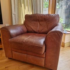brown leather sofa and arm chair