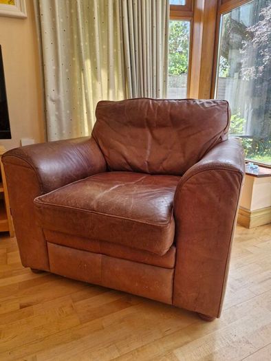 brown leather sofa and arm chair