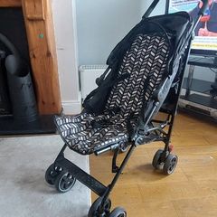 Stroller/buggy with hop on buggy board