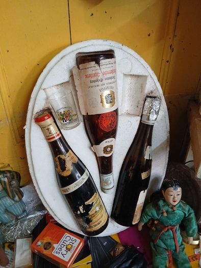wine case with vintgae bottles.