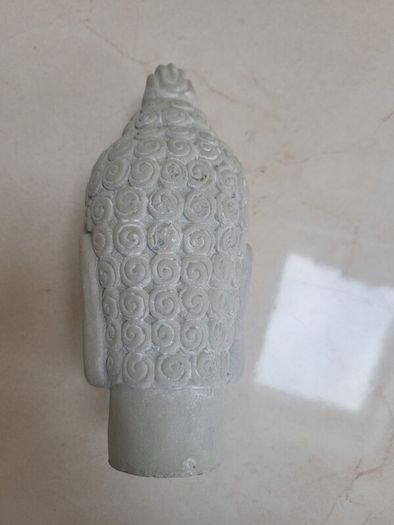 small concrete buddah decor piece