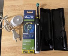 Braun Oral B Professional Care Electric Toothbrush & Brand New Heads