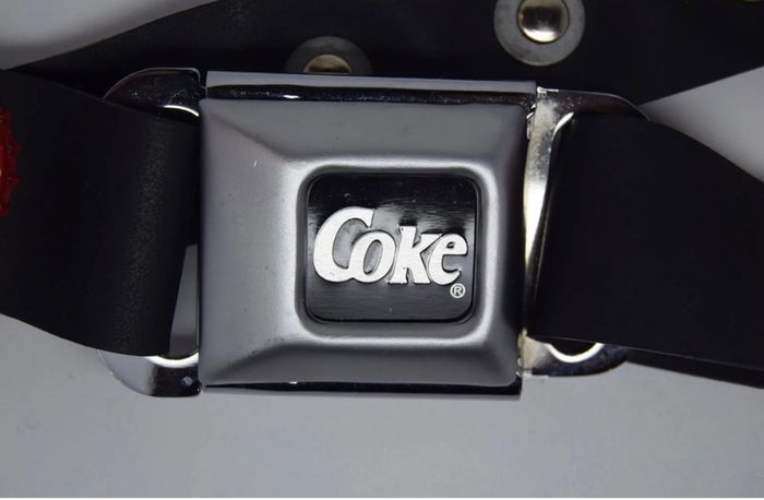 Coca Cola belt with cola caps from all over the world