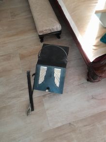Coal Scuttle Iron with   2 tongs included.REDUCED