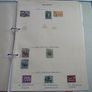 A collection of stamps from various countries on pages in binder (1880s-1990s) Image 4