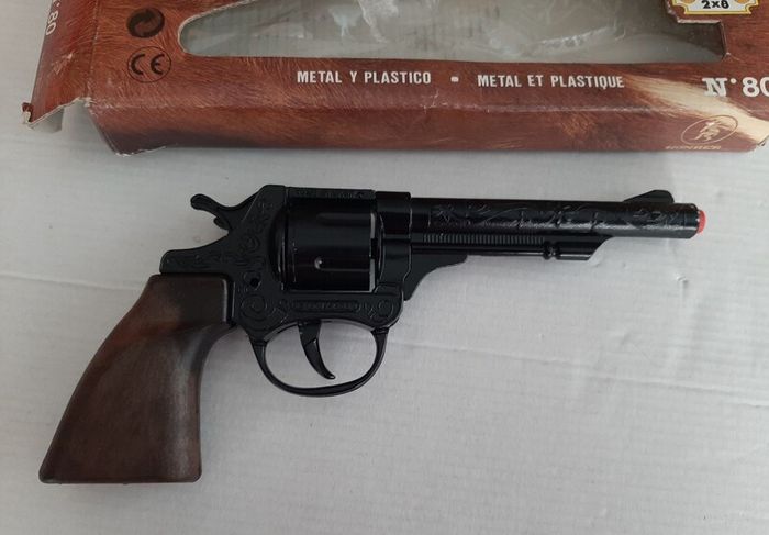 vintage new toy gun in box and holster