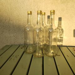 75cl Bottles. Clear glass. Contained apple Juice