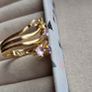 The ring has a unique stacked design with several bands and beautiful pastel/coloured stones, including purple, green and champagne tones. The hallmark has worn away over time, but the ring was tested today and confirmed as genuine 14K gold weight 3.95g. Image 6