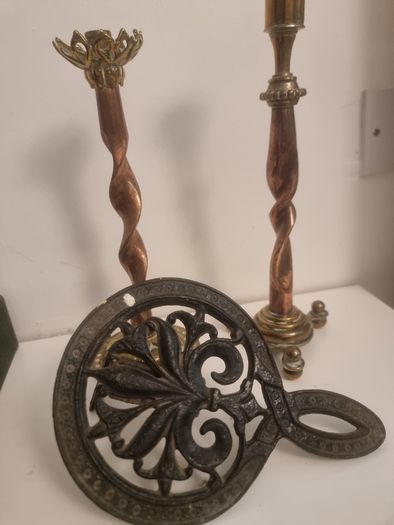 Two unusual gothic brass and copper candlesticks