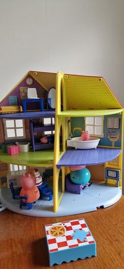 Assortment of peppa pig toys