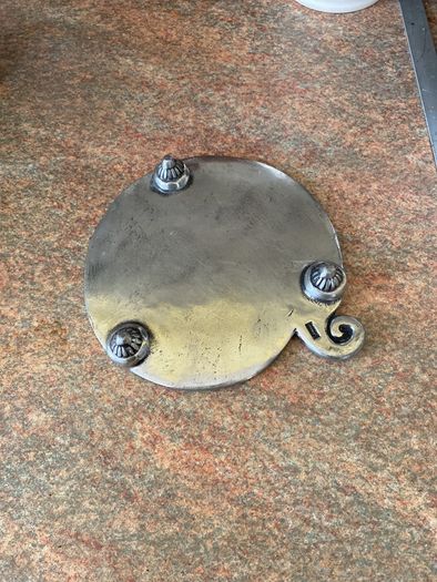 Decorative silver trivet