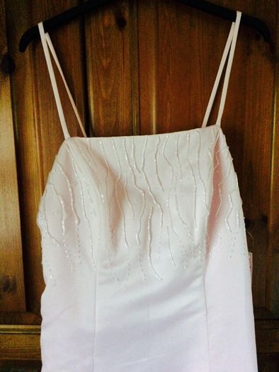 Baby pink dress.