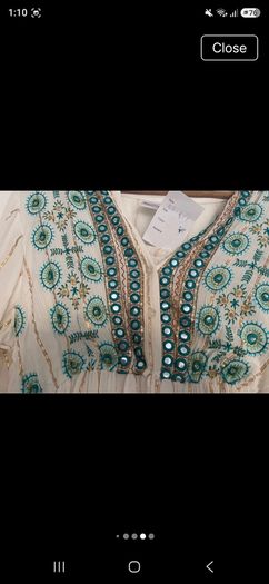 Stunning maxi dress  one size fits all .  new with tags  beautiful  on