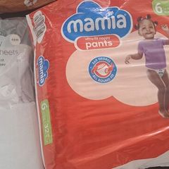 travel cot sheets and nappies