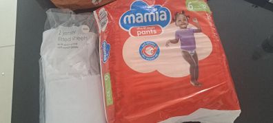 travel cot sheets and nappies
