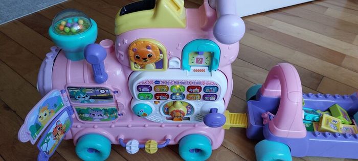 V-Tech pink walker/ride on train