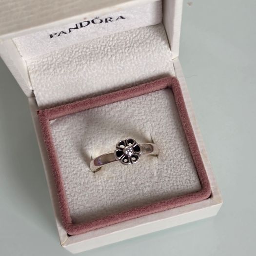 Pandora flower ring size 56 (P) also I have matching charm/pendant in my add( box not including)