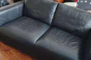 black leather two seater couch