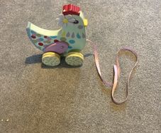 Cute wooden pull-along chicken