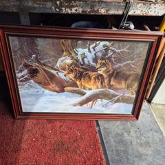 picture frame of wolfs