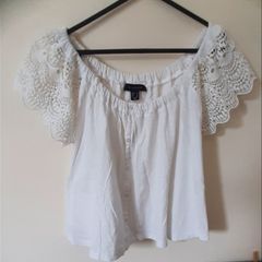 Ladies top with detailed sleeves