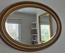Large Antique Oval Bevelled Mirror.