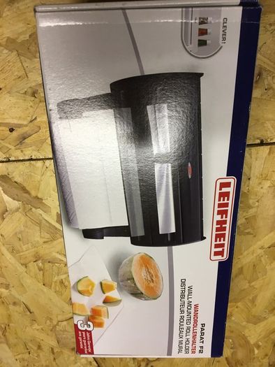 Wall-mounted roll holder