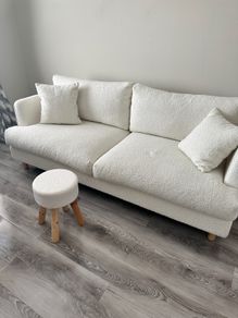 Cream textured sofa and stool