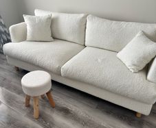 Cream textured sofa and stool