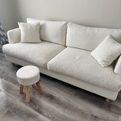 Cream textured sofa and stool
