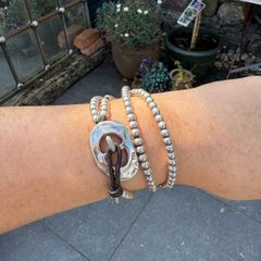 Leather and silver double wrap designer uno de 50 bracelet