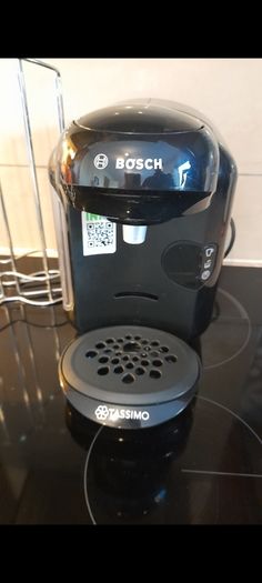 Bosch TASSIMO Coffee Machine (Black) + Chrome Pod Holder & Cleaning Disc