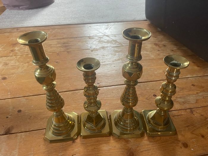Collection of brass and copper candle holders