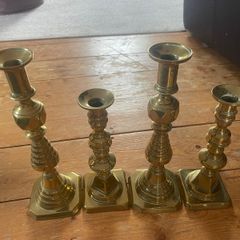 Collection of brass and copper candle holders