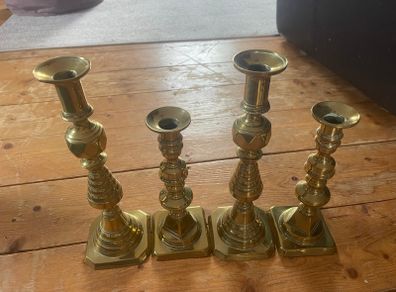 Collection of brass and copper candle holders