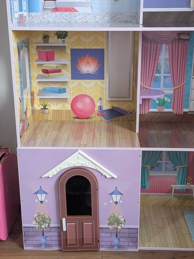 Large wooden dolls house with furniture