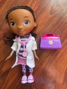 Doc McStuffins doll with bag