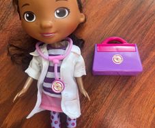 Doc McStuffins doll with bag