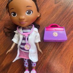 Doc McStuffins doll with bag
