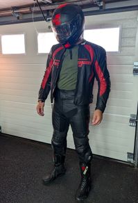 Full Motorcycle protection leather two piece suit,  helmet and boots.