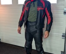 Full Motorcycle protection leather two piece suit,  helmet and boots.