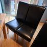 4 Black leather style kitchen chairs. Very few scuff marks 80 Image 5
