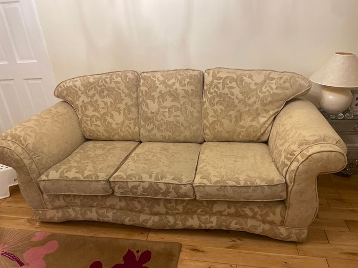 Three seater sofa and one armchair