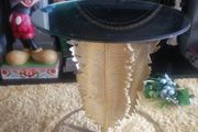 unusual gold palm leaf mirror top table