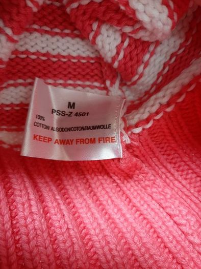 new pink and white cotton jumper tag attached