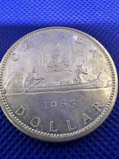 X3 Canadian silver dollar coins