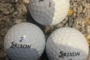 Three Srixon golf balls